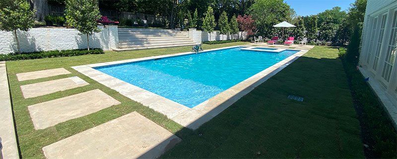 Completed Pool Remodel project with landscaping