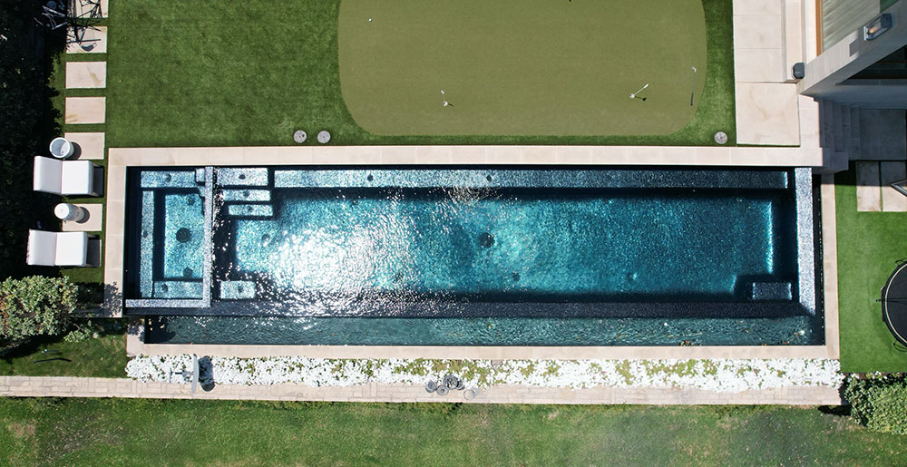 Completely black tiled pool - drone